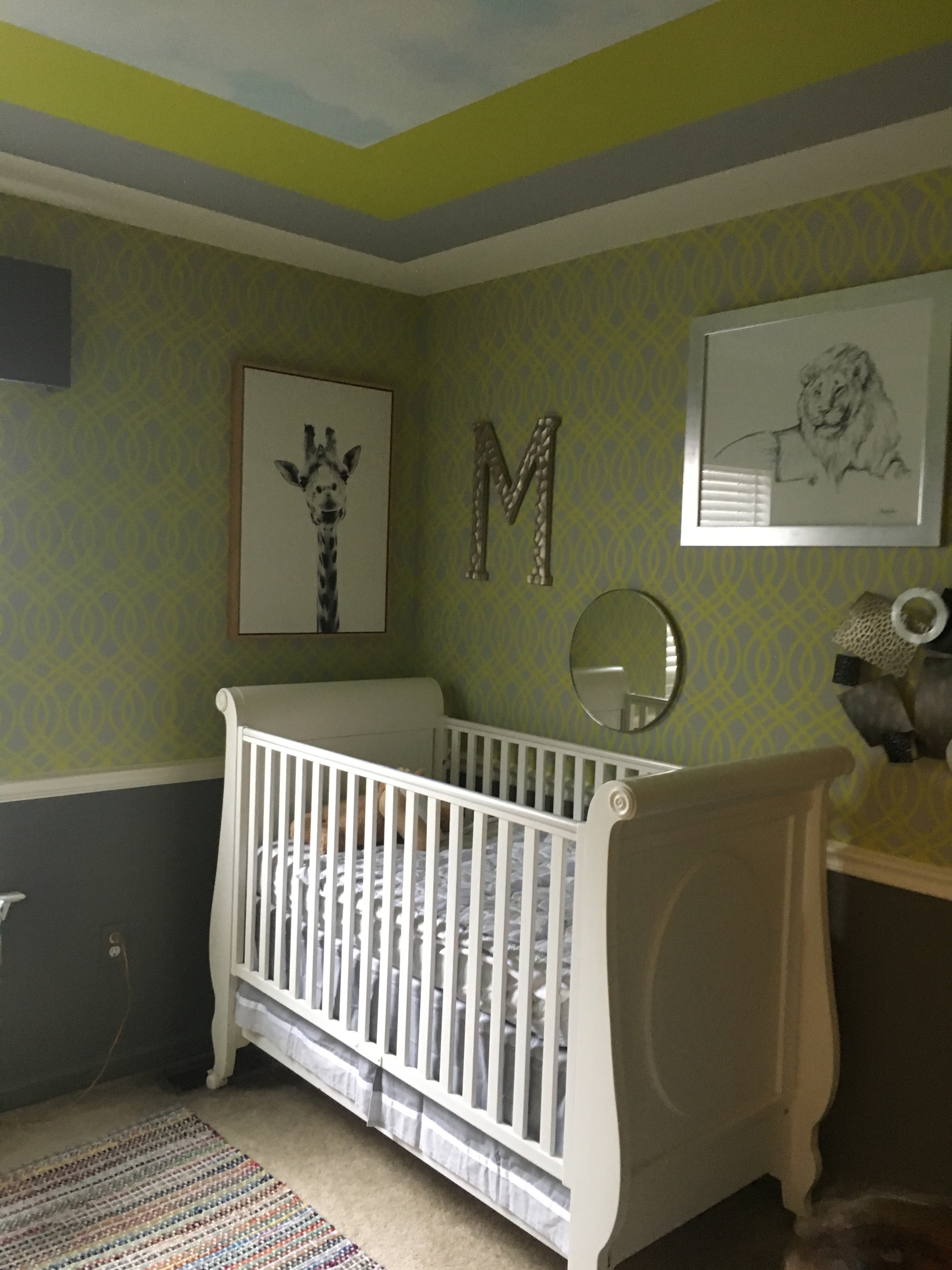 Miles bedroom is stenciled in a gray and chartreuse pattern.