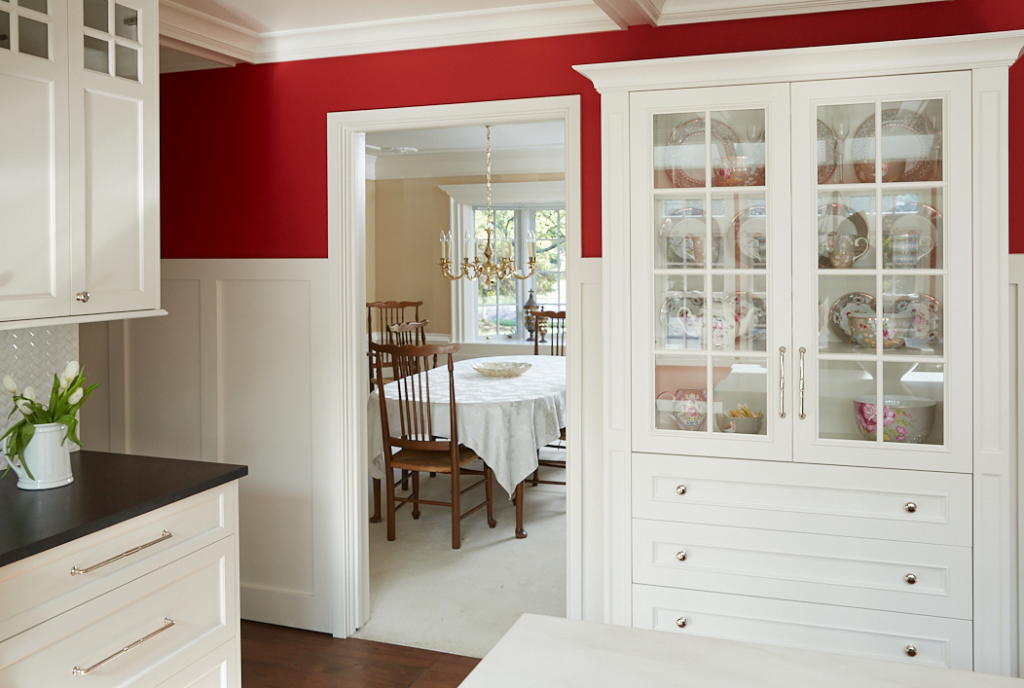 Kitchen Remodel wainscoting in red kitchen. Vertical panels