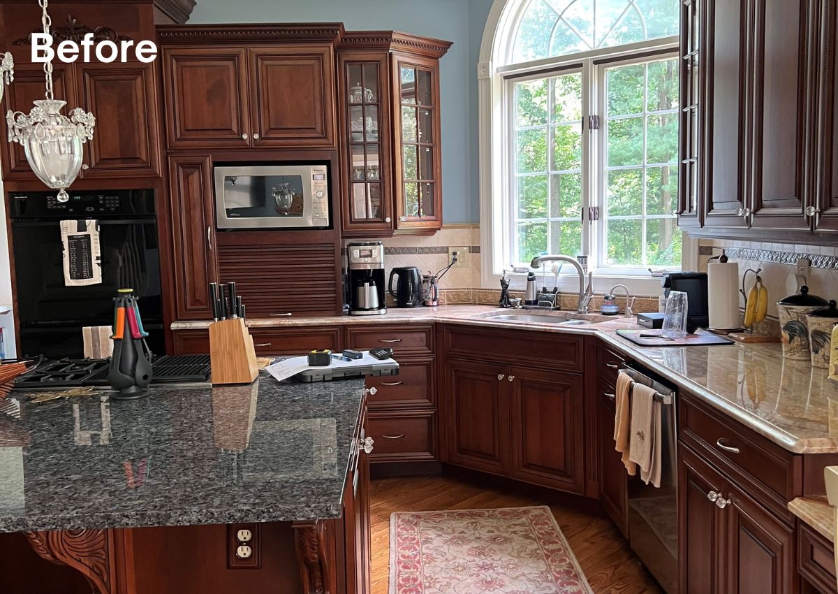 Before picture of an Ambler kitchen with dark cabinets