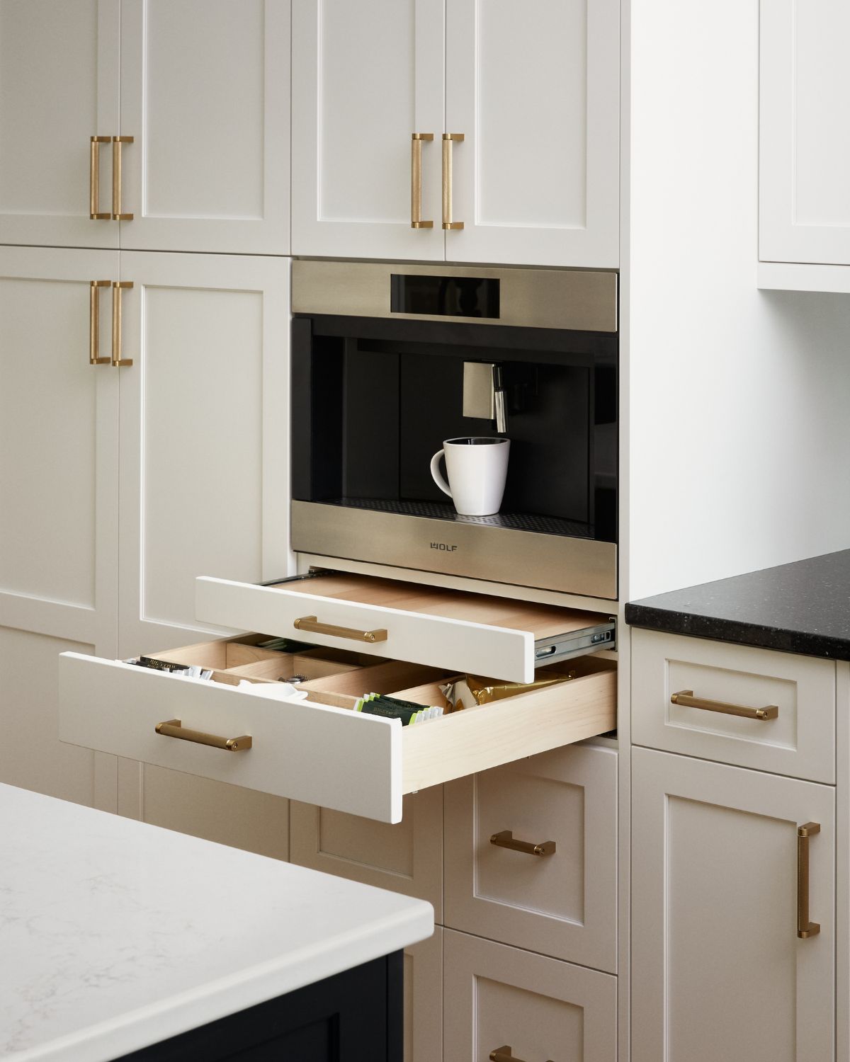 Custom coffee maker integrated into the cabinetry of this newly renovated kitchen in Ambler