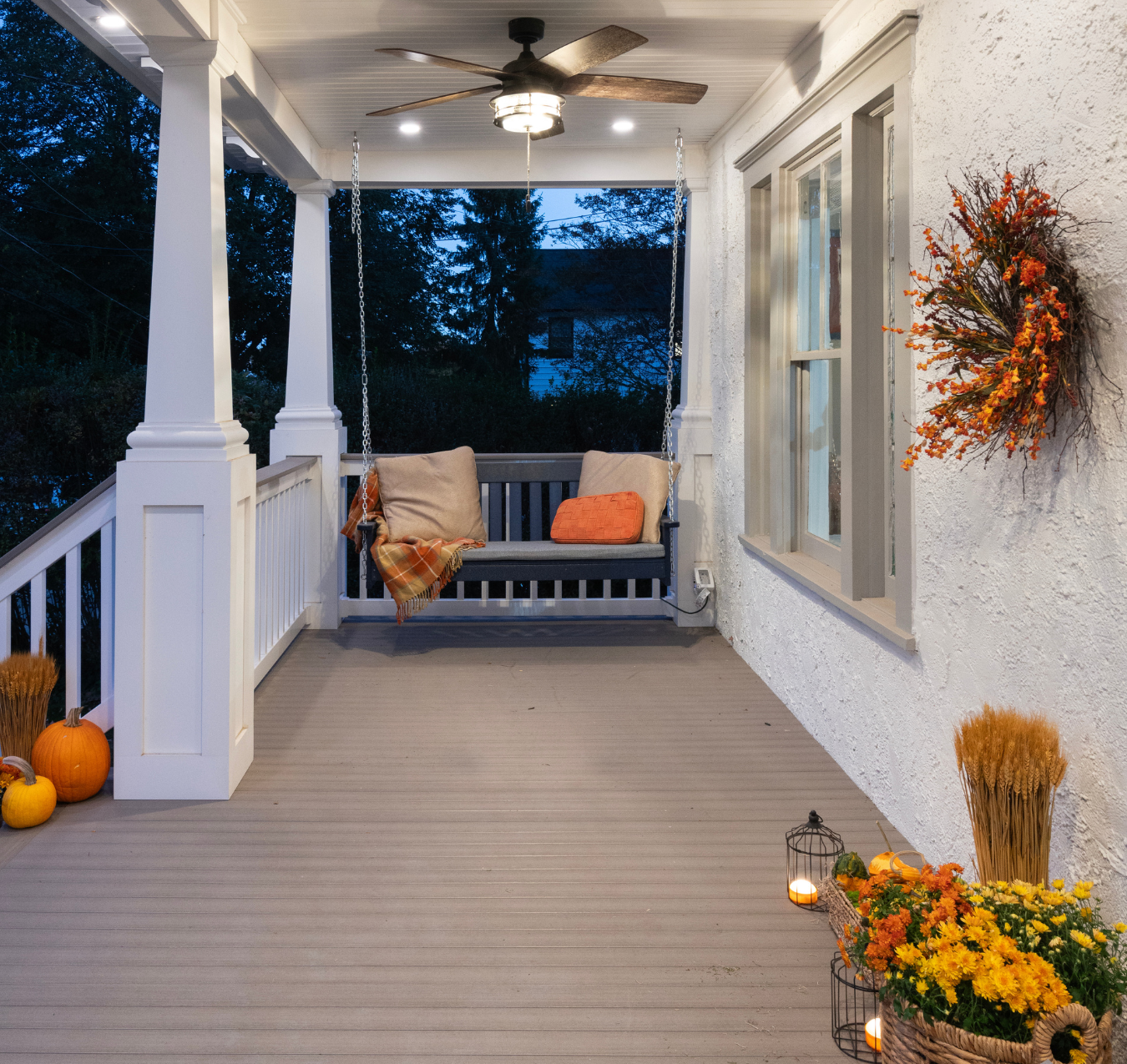 Swing and ceiling fan on a renovated porch of a home in Havertown, PA