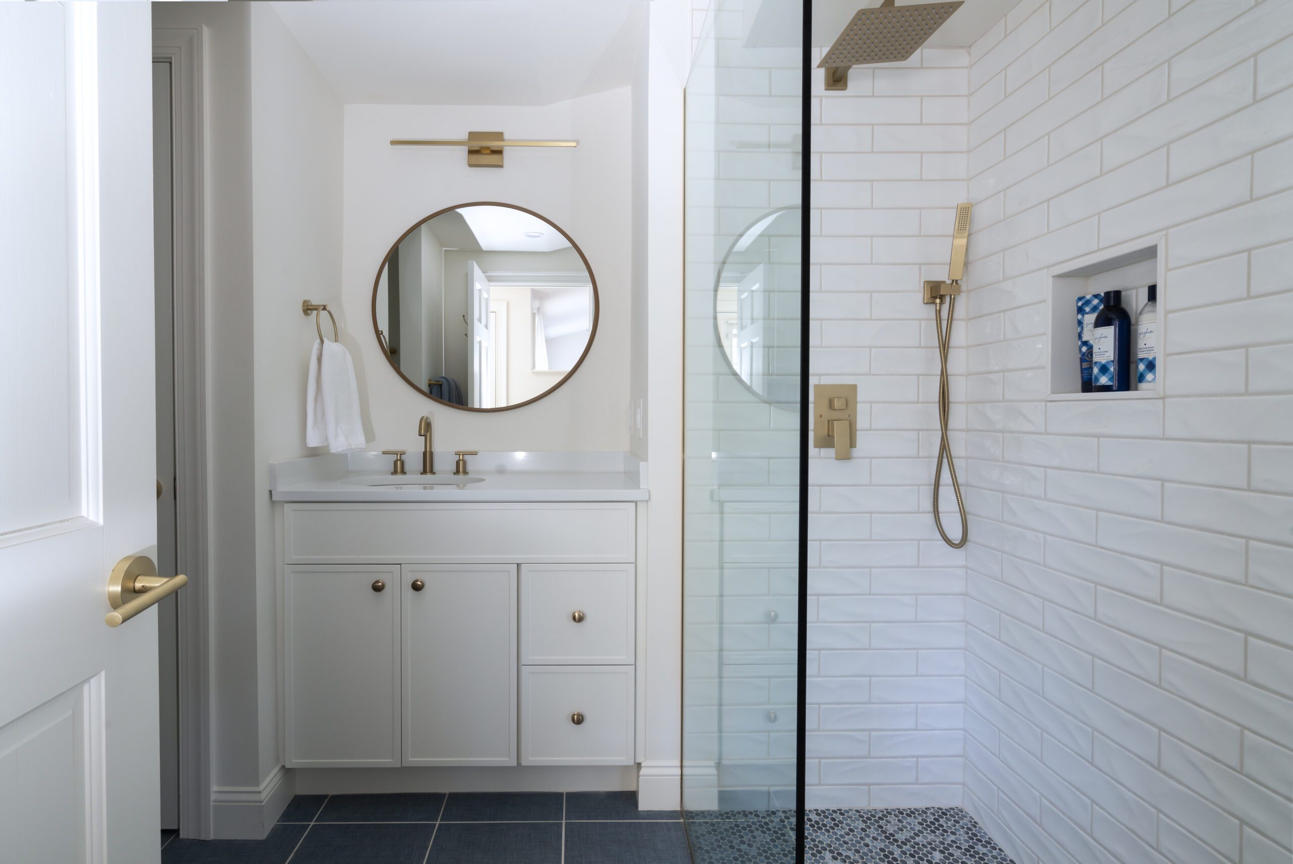 Blue and white bathroom in a detached ADU